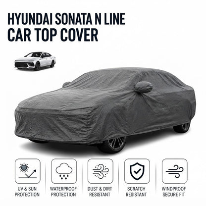Gray fitted car top cover draped over the full vehicle
