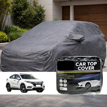 Gray non-woven waterproof car top cover with fitted drape on vehicle roof