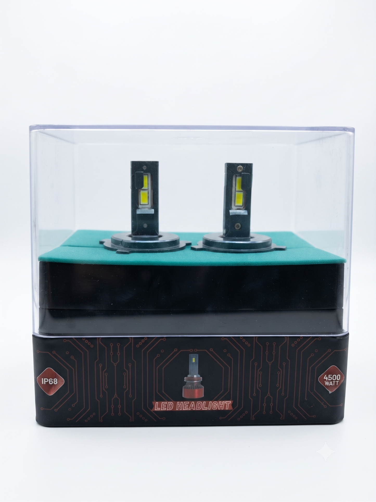 Pair of LED headlight bulbs in clear display box on black and green top