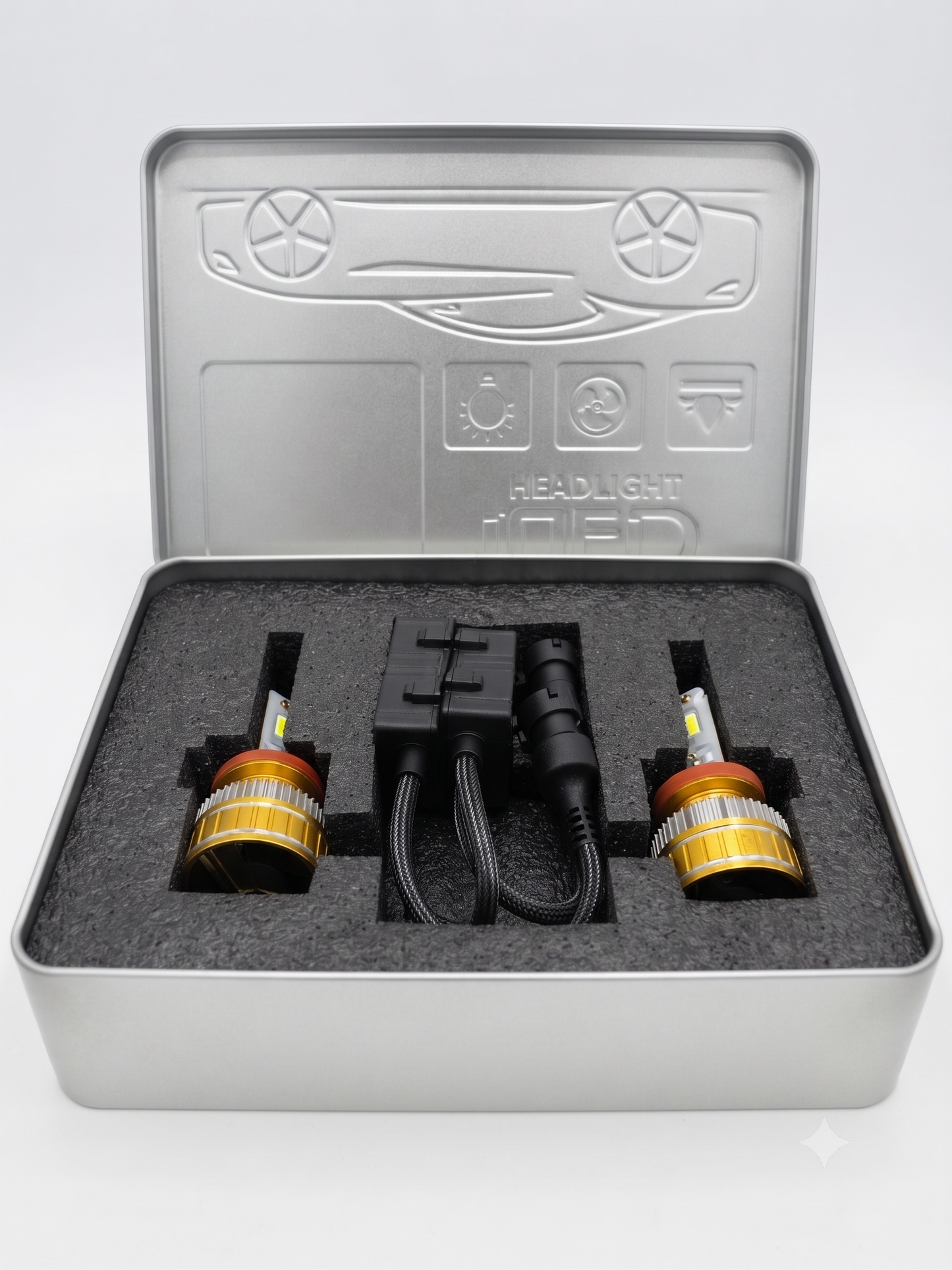 H11 LED headlight bulb kit with two gold-capped bulbs and controller box in case