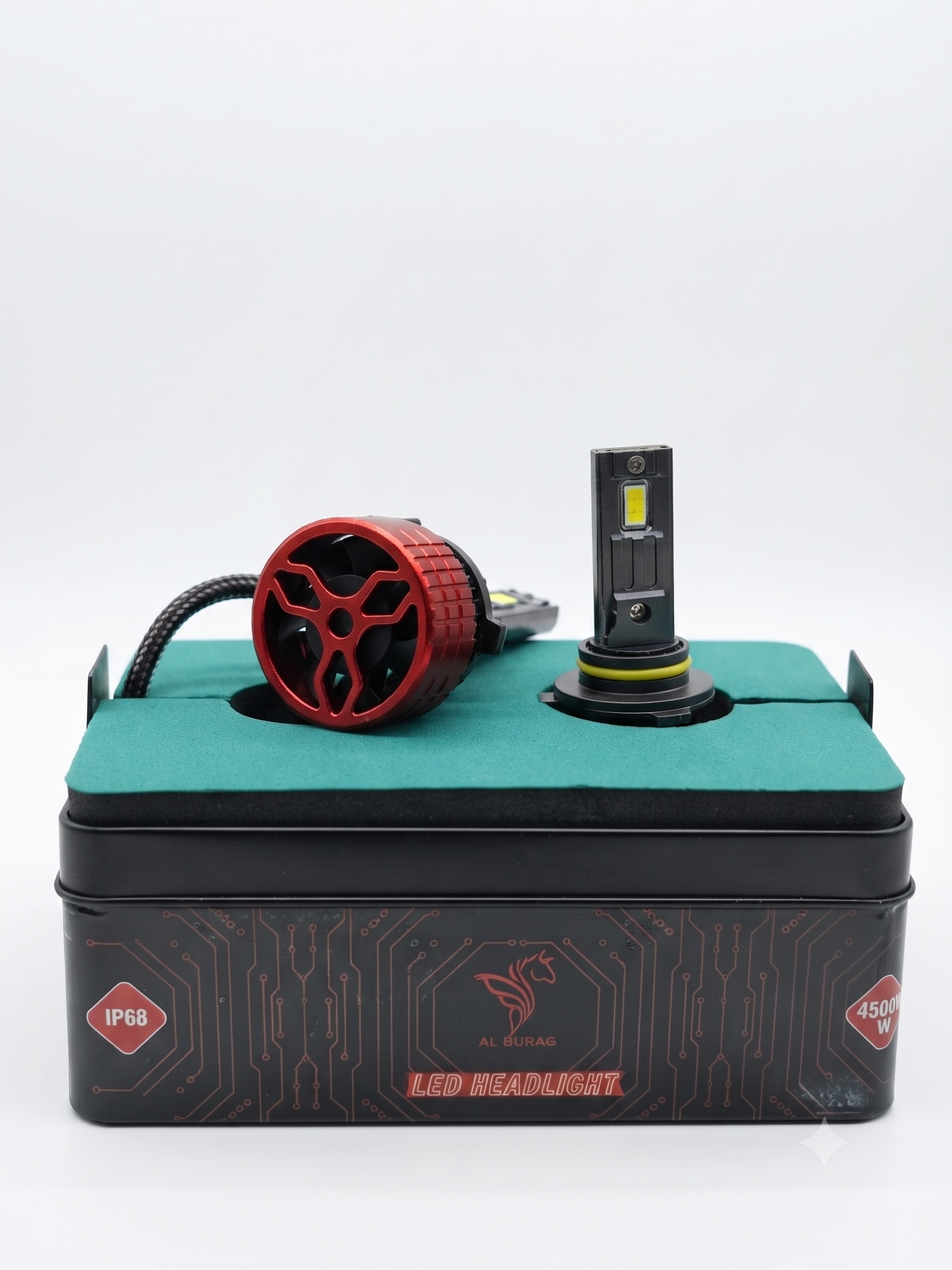 Pair of fanless LED headlight bulbs with black heat sink and red connector head