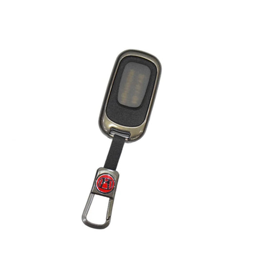 Metallic grey car key fob cover with Honda logo, protective case and key ring