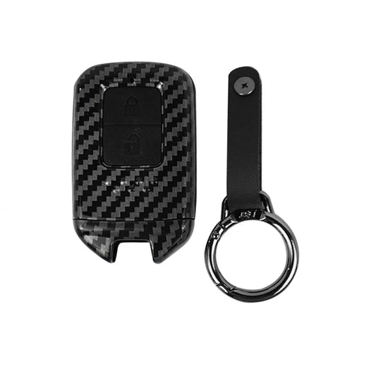 Carbon-fiber key cover case with black key ring and button cutout