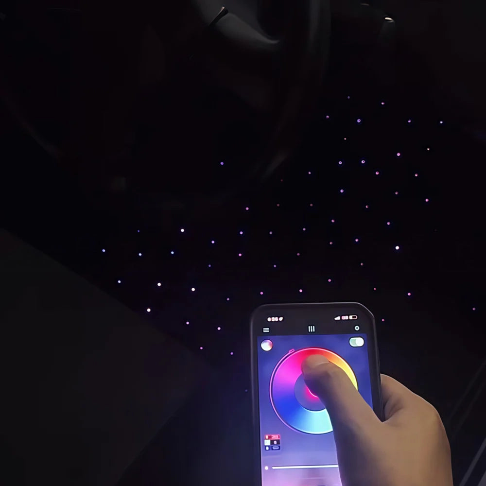 Car floor mat with blue fiber-optic star lights, controlled by a smartphone