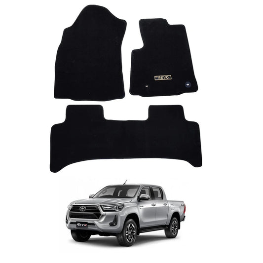 Black carpet floor mats set with vehicle floor cutouts