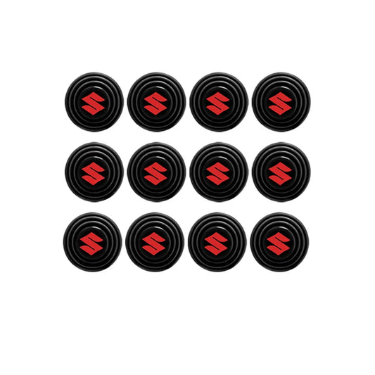 Pack of 12 black rubber shock absorber cushions with red emblem on the face.