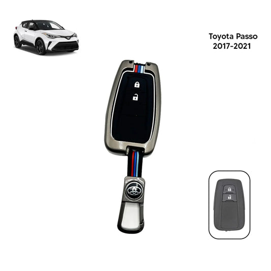 Metallic grey key fob cover with black button panel and key ring loop for Toyota models.