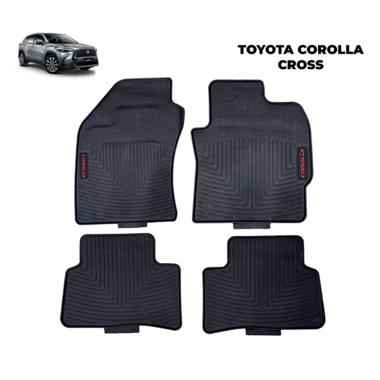 Set of four black rubber car floor mats with embossed tread and side grip edges