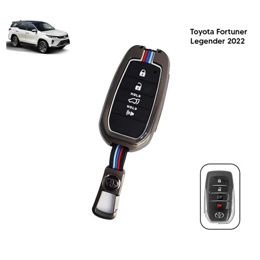 Black remote key shell with blue and red stripe trim and button side view
