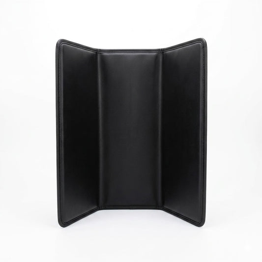 Black roll-up pickup bed lid cover with padded arched panels.