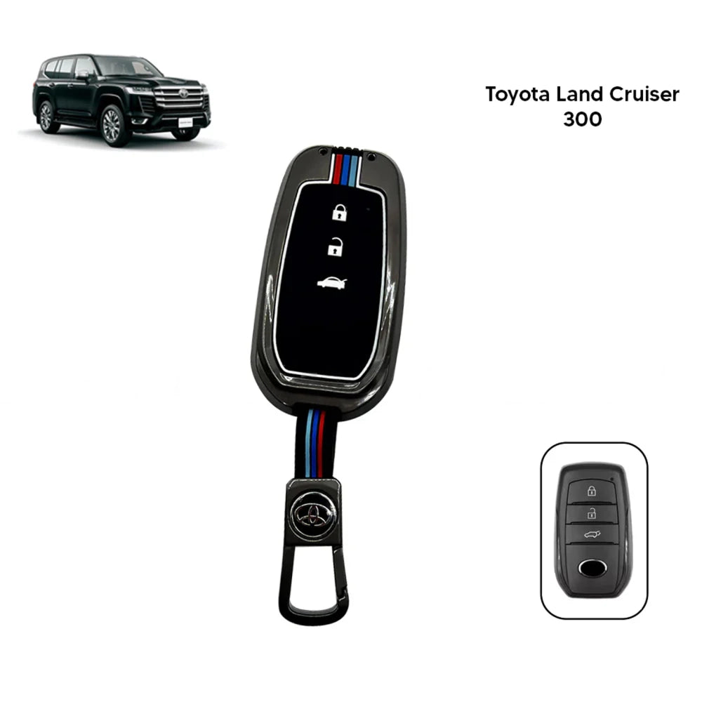 Toyota key fob metal key cover with black silicone sleeve and button controls
