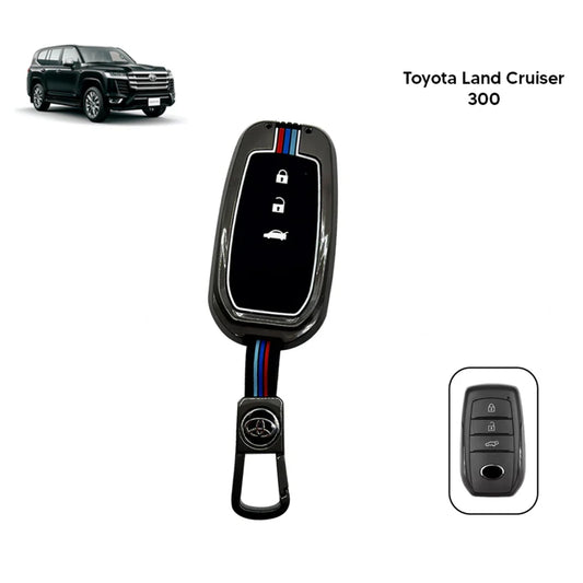 Toyota key fob metal key cover with black silicone sleeve and button controls