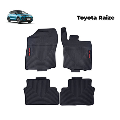 Set of four black Toyota Raize rubber floor mats with molded grooves