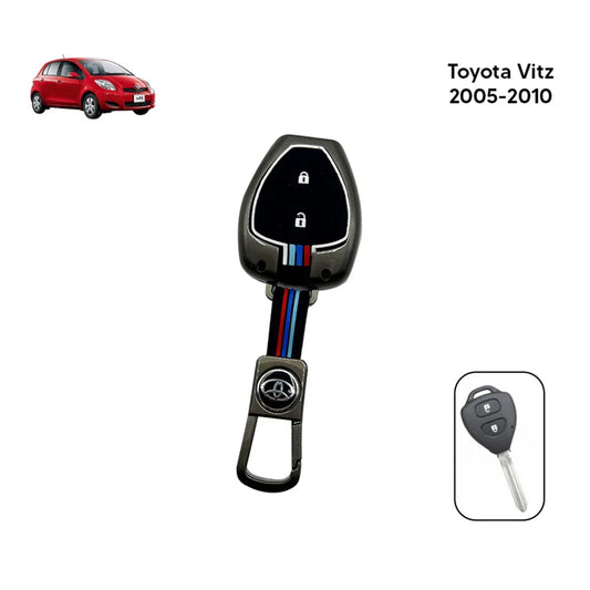 Black Toyota key fob cover with metal flip insert and striped side accents