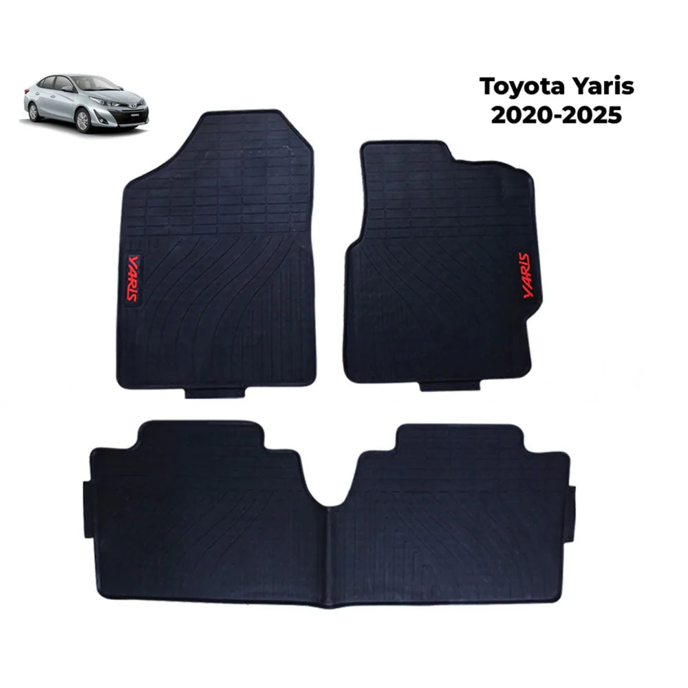 Black rubber floor mat set with textured grooves and Yaris logo