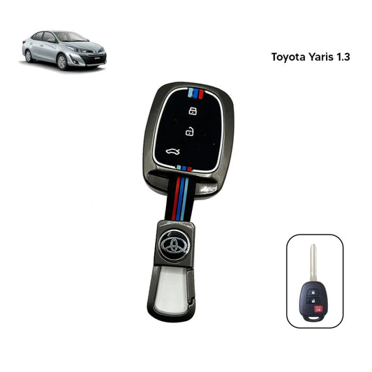 Toyota key fob metal cover, black shell with buttons and blue/red stripe, front view
