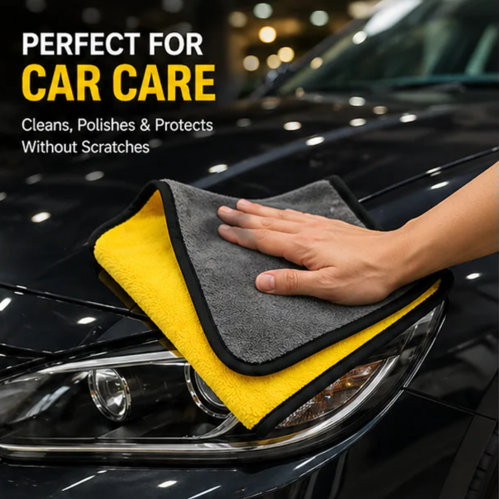Microfiber cloth cleaning car windshield streak-free